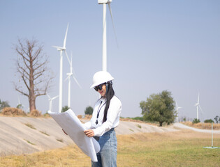 Architect working on the basis of a wind turbine Check the structure
