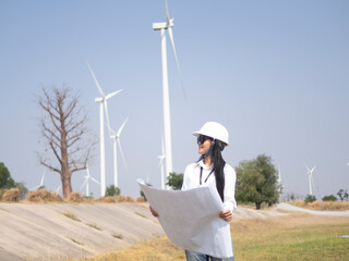 Architect working on the basis of a wind turbine Check the structure