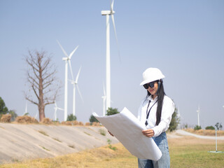 Architect working on the basis of a wind turbine Check the structure
