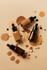 Obraz premium Bottles of different foundation make up products