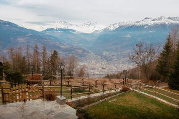 City of Aosta from above with mountains behind