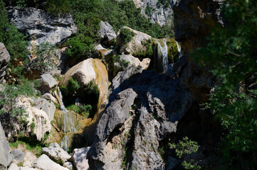 The waterfalls of the Guadalquivir River in the Utrero Cerrada, in the Sierra de Cazorla, Segura y las Villas natural park. Andalusia. Jaen. Spain