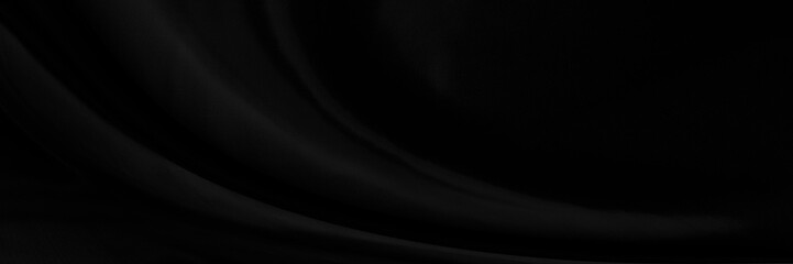 Black gray satin dark fabric texture luxurious shiny that is abstract silk cloth panorama background with patterns soft waves blur beautiful.