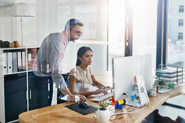 Business people, teamwork and leader on computer for advice, feedback and reading online at...