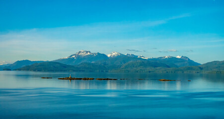 Beautiful calm waters and breathtaking forest and mountain landscapes, Inside Passage, Alaska, USA