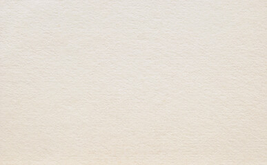 A sheet of beige rough cardboard texture as background