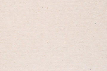 A sheet of beige recycled cardboard texture as background