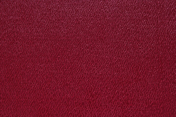 Fototapeta premium Maroon color grainy fine leather texture as background
