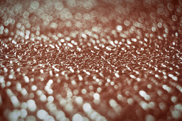 Golden de focused sparkle glitter background close up