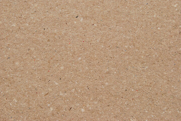 A sheet of brown recycled cardboard texture as background