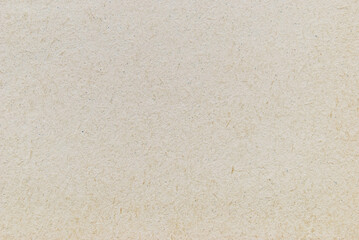 A sheet of recycled cardboard texture as background