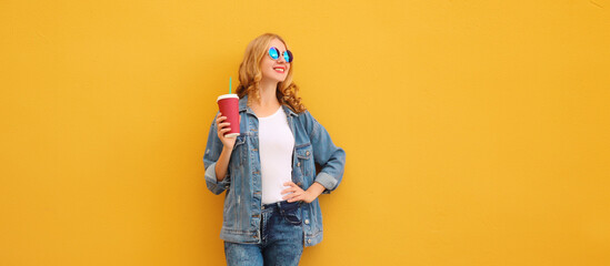Summer joyful young woman with cup of coffee, stylish modern girl holding juice in casual clothes