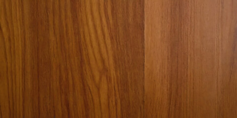 Close-up of smooth, light brown wood grain with natural vertical lines. Ideal for backgrounds, textures, or showcasing woodworking projects.