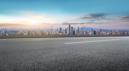 City Skyline View from an Empty Road