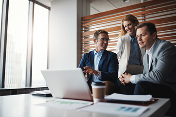 Paperwork, laptop and business people in office for discussion with revenue or profit report. Meeting, team and group of financial advisors with computer and company finance documents in workplace.