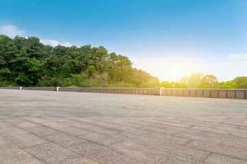 Serene Sunrise Over a Spacious Park Plaza © zhouyilu