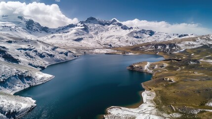 Panoramic aerial view of snowy mountains. Free space.
