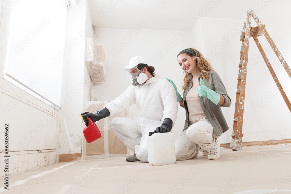 Wall mural call the mold removal service for mold remediation treatment. smiling woman resolve problem and show