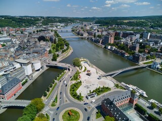 Confluence of Sambre and Seine rivers in Namur, Belgium, on a sunny day. Aerial view.