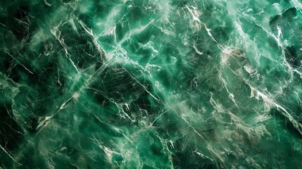 Fototapeta premium marble texture background in deep emerald green with white veins, integrated with walnut wood elements. The highly polished marble and smooth wood create a rich and inviting backdrop, making the furn