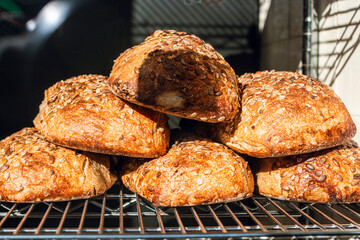 Assorted breads displayed on a grill