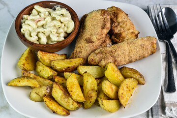 chicken tenders  served with potato wedges