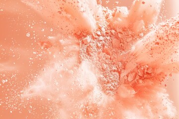 Fototapeta premium A stunning explosion of delicate peach-toned cosmetic powder, captured mid-air in a mesmerizing swirl of soft, ethereal dust clouds