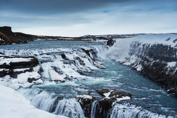 Obraz premium Gullfoss waterfall flowing in Hvita river canyon on winter at Iceland