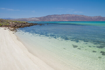 Beautiful beach on Coronado Island with a sunny and calm day to enjoy the vacation and admire the nature of Baja California Sur. Mexico. Baja style holidays with crystal clear sea.