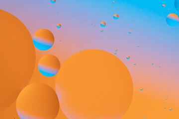 Colorful circles floating on a gradient background.