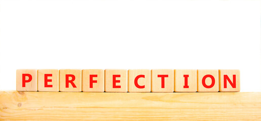 Perfection symbol. Concept word Perfection on beautiful wooden blocks. Beautiful white background. Business perfection concept. Copy space.