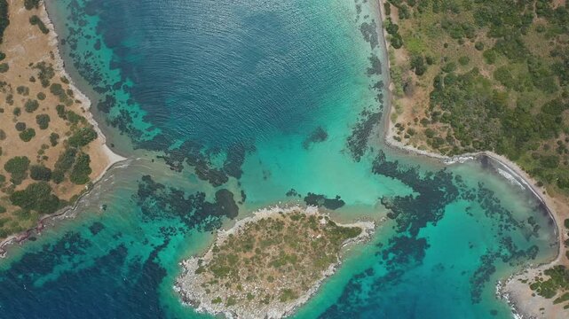Aerial view of islands in the sea. Beautiful shallow sea with turquoise water. Nature of Turkey