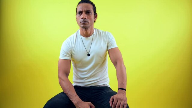 Nervous person sitting on stool