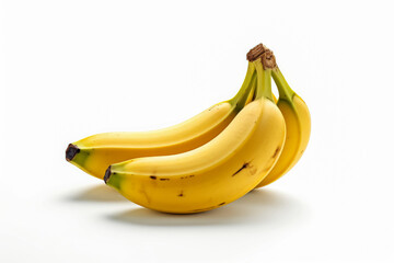 A banana is shown on a white background. The banana is long and yellow, with a green stem at the top. Concept of freshness and natural beauty, as the banana is a simple and unadorned object