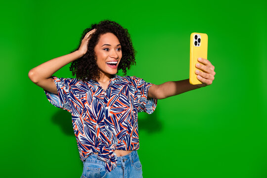 Photo of charming girly lady wear print shirt tacking selfie apple iphone samsung modern device isolated green color background