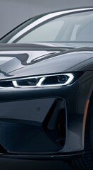 Fototapeta premium A silver sports car with a futuristic design is shown in profile.