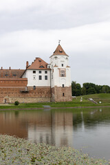 Fototapeta premium Mir Castle Complex in summer on a gloomy day