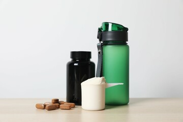 Sports nutrition and various supplements on the table