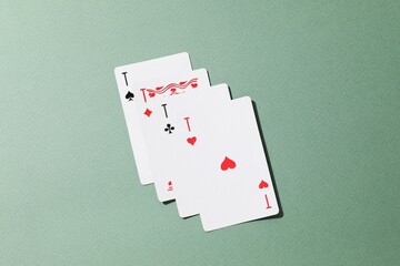Playing cards on color background, top view. Gambling concept