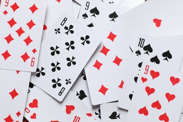 Playing cards on color background, top view. Gambling concept