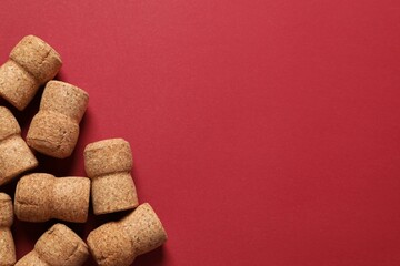 Corks of champagne on colored background