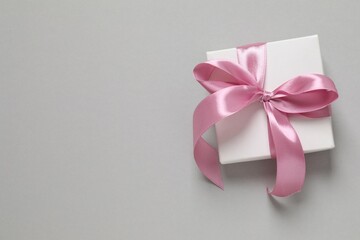 Beautiful gift on a gray background