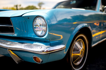 Close up view of blue classic American muscle car.