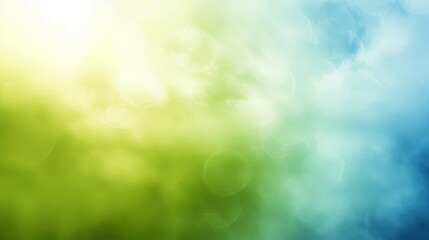 Fototapeta premium Abstract background with green and blue clouds, a bright light shines through the clouds.