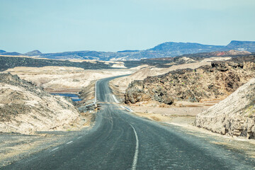 Djiboutian landscape on the road to lake Assal with mountains in the background, Tadjourah region, Djibouti, Horn of Africa