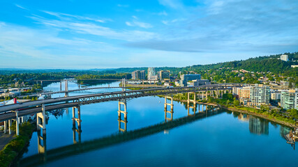 Fototapeta premium Aerial View of Portland Bridges and River at Golden Hour
