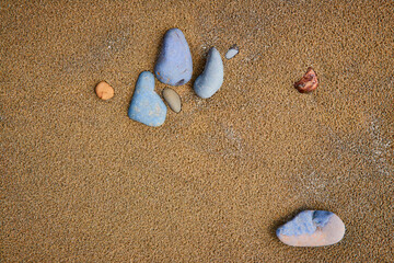 Serene Stones on Sandy Beach Close-Up