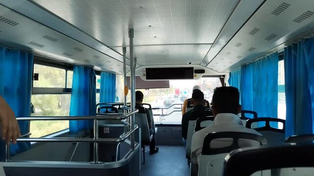 Inside view of a double-decker bus.