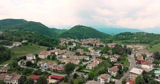 Aerial view cityscape Cornuda Italy. Urban landscape and architecture of a village in the mountains. High quality 4k footage