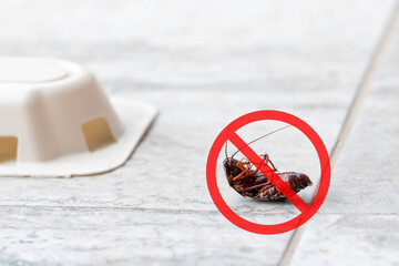 Anti cockroach, pest control concept. Stop insects sign. Cockroach with caution sign, pest control in red forbidding circle